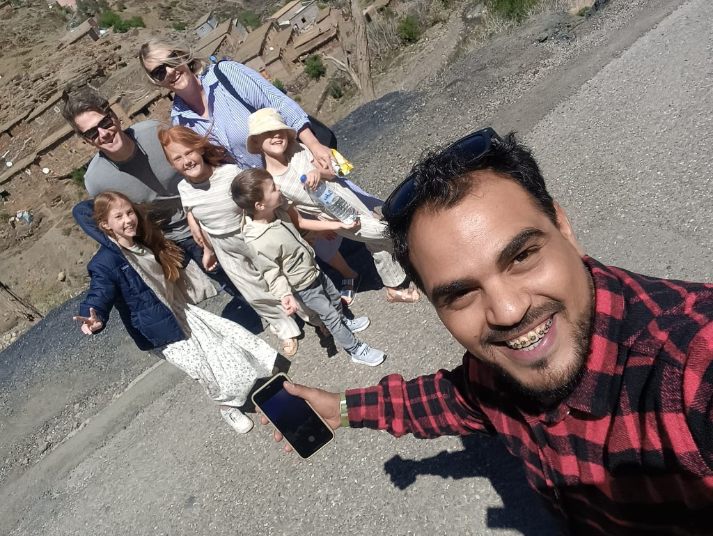 Family selfie on a mountain road