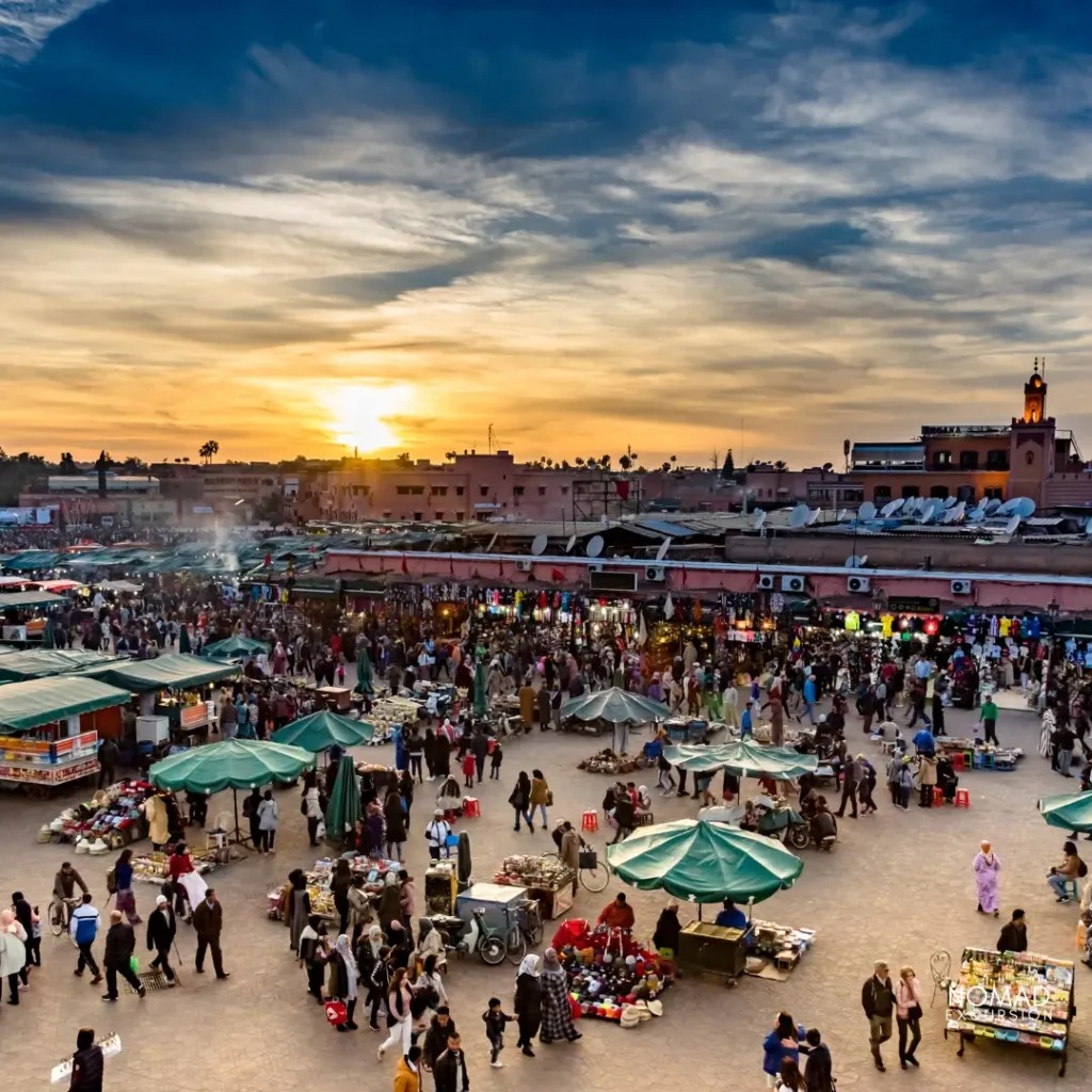 Koutoubia Mosque in Marrakech at sunrise with warm golden light illuminating the traditional Moroccan-Islamic architecture